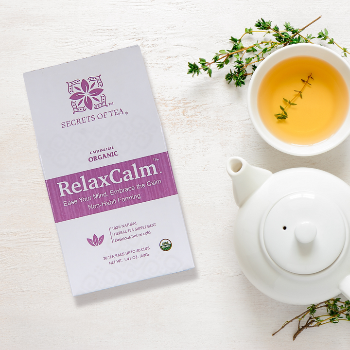 RelaxCalm tea package with teapot and cup of tea.